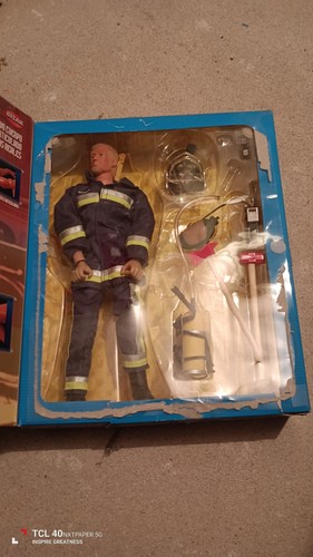 Geyperman fire department doll - department,
